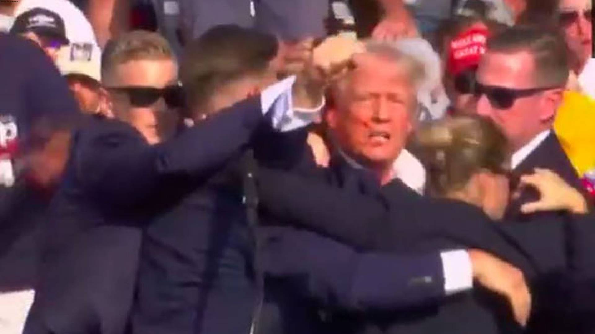 Gunfire at Donald Trump's rally in Pennsylvania, secret service escorts former US President to safety